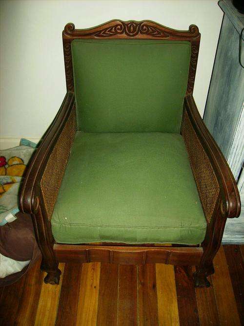 Beautiful ball and claw style  armchair with lattace on sides kiaat wood very heavy