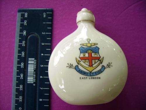 lovely old bottle looks like an old water or wine flask crested  miniature