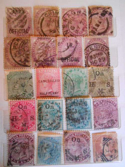 Mini album full of stamps main stamps Queen Victoria from various countries etc see more below
