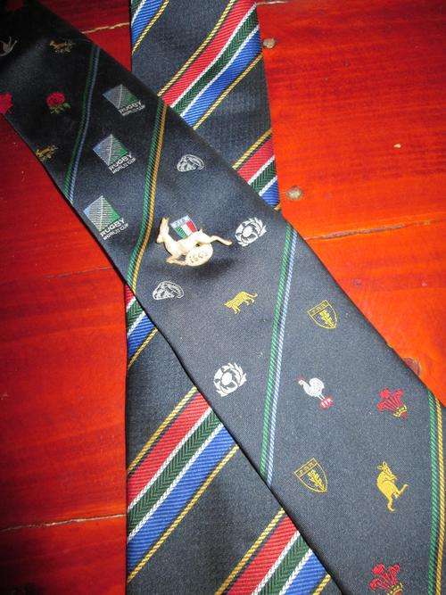 Rugby World Cup tie 1995 and another tie World cup and bokkie pin 1949 one bid
