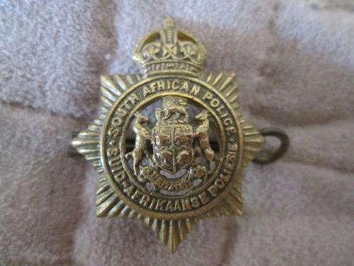 SMALL BRASS POLICE BADGE