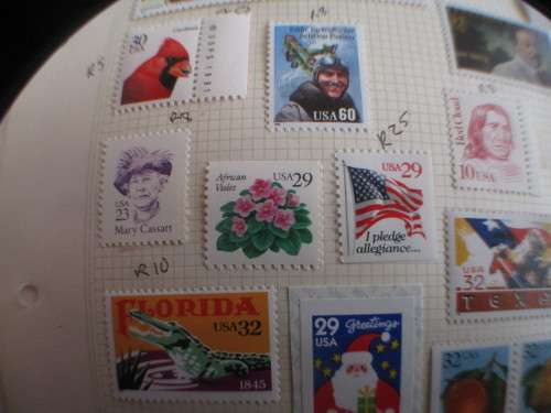 AMERICA - USA LOT OF UNUSED MOUNTED STAMPS
