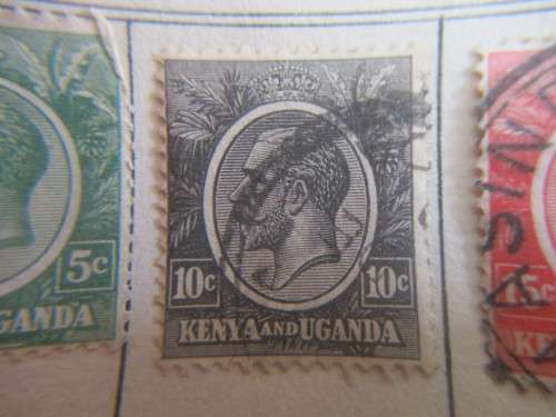 KENYA AND UGANDA - 4  USED MOUNTED KING GEORGE V STAMPS