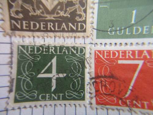 NETHERLANDS PAGE OF USED MOUNTED STAMPS
