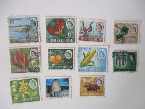 RHODESIA  LOT OF USED  UNMOUNTED STAMPS