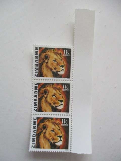 ZIMBABWE - LION 11c MINT STAMPS BLOCK OF 3