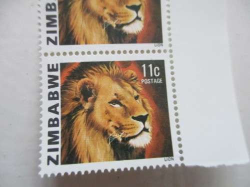 ZIMBABWE - LION 11c MINT STAMPS BLOCK OF 3