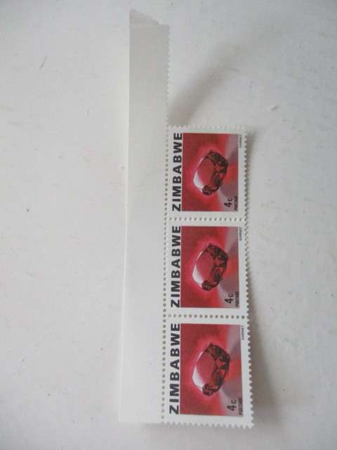 ZIMBABWE - MINT GARNET STAMPS 4c  X3