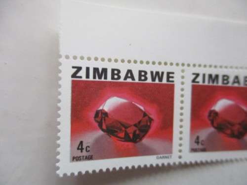 ZIMBABWE - MINT GARNET STAMPS 4c  X3