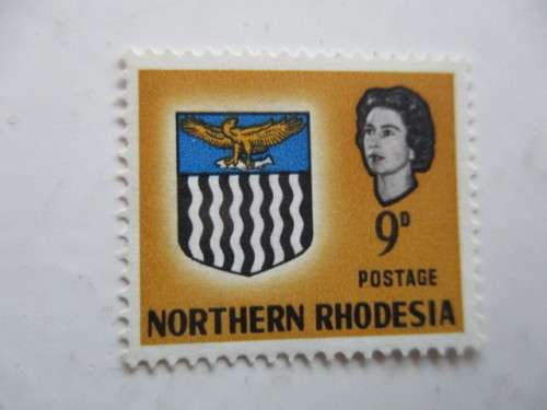 NORTHERN RHODESIA - 1963 COAT OF ARMS 9D MINT STAMP