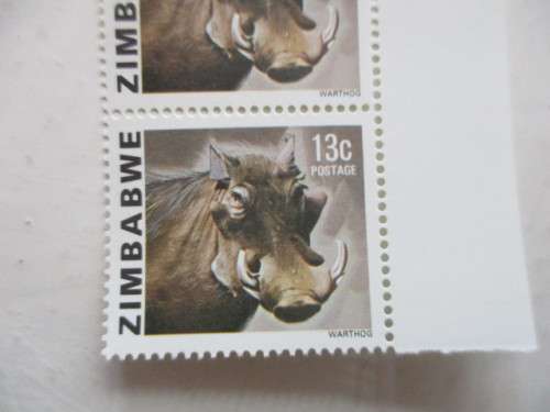 ZIMBABWE -  3 MINT WARTHOG STAMPS