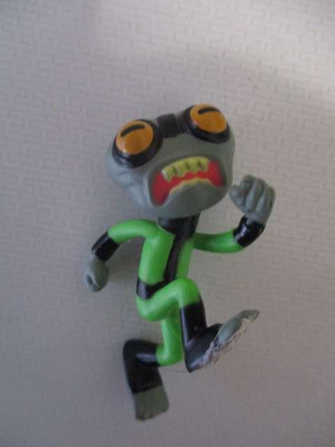 BEN - 10 SMALL FIGUIRINE  APP . 4CM TALL WITH SERIAL NUMBER