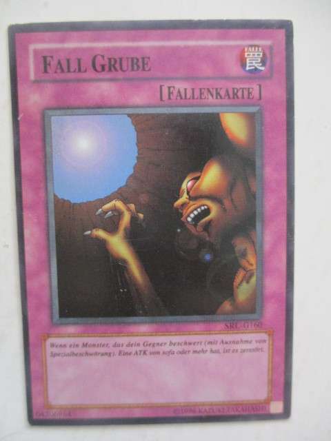 YU-GI-OH TRADING CARD - GERMAN- TRAP HOLE AND ENGLISH