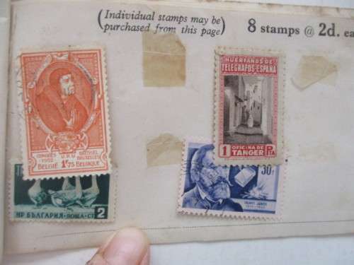 4 USED MOUNTED STAMPS