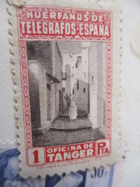 4 USED MOUNTED STAMPS