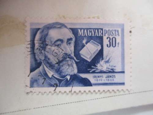 4 USED MOUNTED STAMPS