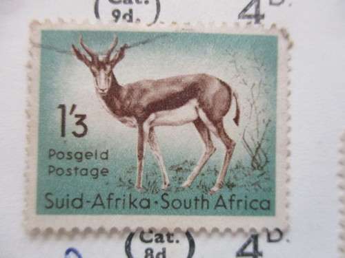 TWO MOUNTED  FINE BRITISH EMPIRE STAMPS