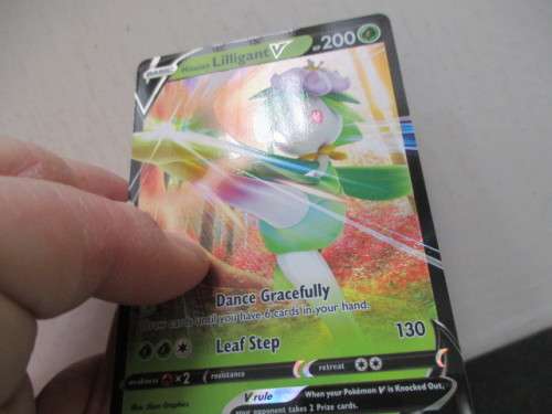 POKEMON TRADING CARD  - PROMO CARD LILLIGANT- HOLO FOIL CARD AS NEW PLUS 2FREE CODES TO NLOCK PC GAM