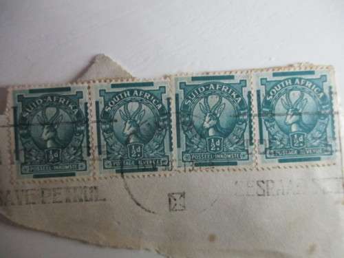 SOUTH AFRICA USED 4 MOUNTED STAMPS