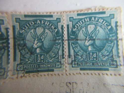 SOUTH AFRICA USED 4 MOUNTED STAMPS