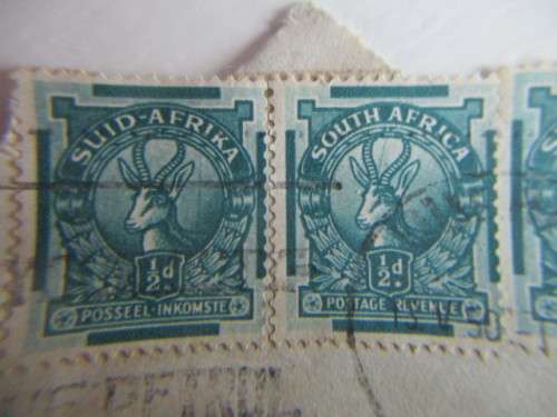 SOUTH AFRICA USED 4 MOUNTED STAMPS