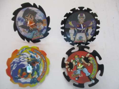 LOTOF SPINNER TAZOS WITH CENTRE SPIKE LOT OF 4