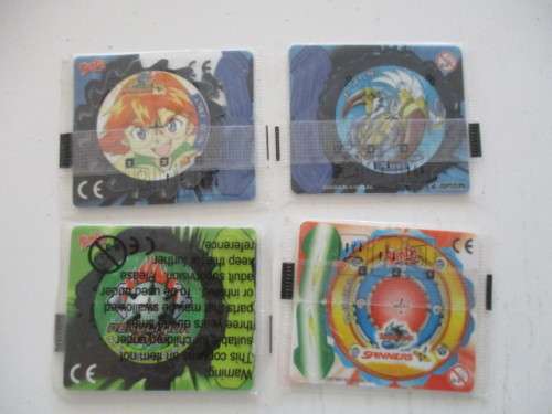 SIMBA  LOT OF 4 UNOPENED  SPINNER TAZOS
