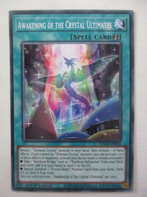 YU-GI-OH TRADING CARD - AWAKENING OF THE CRYSTAL ULTIMATES