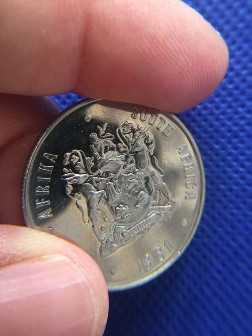BEAUTFUL TONED R1 COIN  HAS SLIGHT BLUE HUE TO IT 1981 MIRROR IMAGE