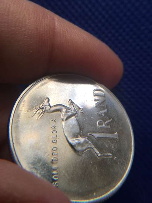 BEAUTFUL TONED R1 COIN  HAS SLIGHT BLUE HUE TO IT 1981 MIRROR IMAGE