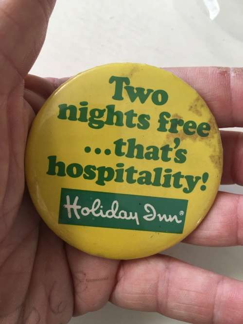 VINTAGE - HOLIDAY INN METAL BADGE