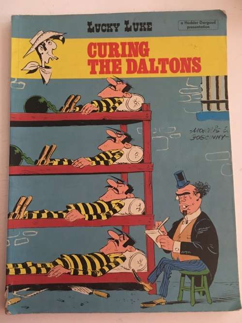VINTAGE - LUCKY LUKE - CURING THE DALTONS -  FIRST PUBLISHED IN GREAT BRITAIN - 1982