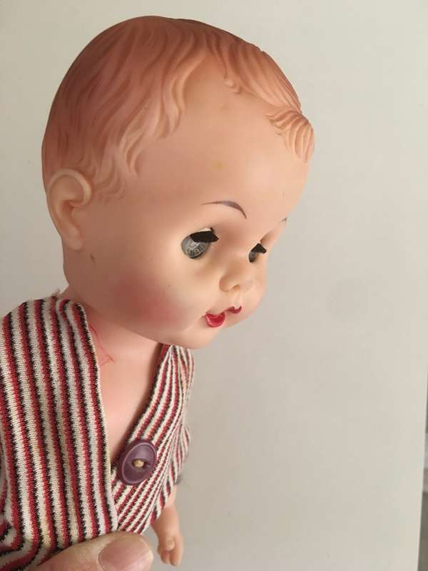VINTAGE BABY RUBBER TYPE DOLL WITH ORIGINAL CLOTHES MOVING EYES AND LETTER  J ON NECK