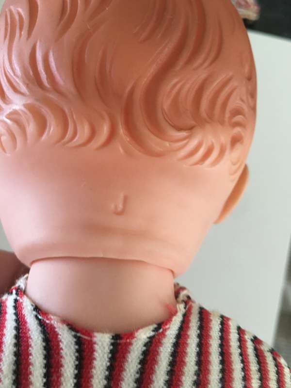 VINTAGE BABY RUBBER TYPE DOLL WITH ORIGINAL CLOTHES MOVING EYES AND LETTER  J ON NECK