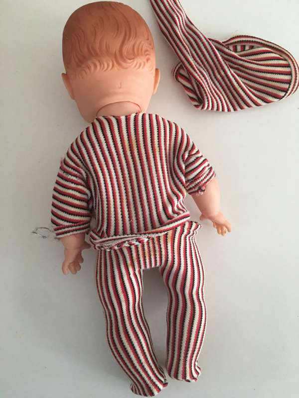 VINTAGE BABY RUBBER TYPE DOLL WITH ORIGINAL CLOTHES MOVING EYES AND LETTER  J ON NECK