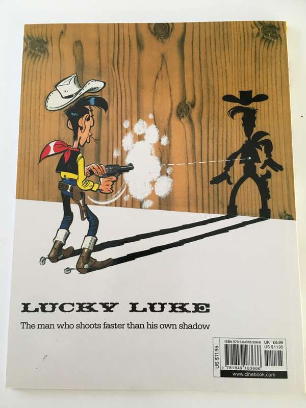 A LUCKY LUKE ADVENTURE - THE PROMISED LAND PAPER BACK 2017  - AS NEW