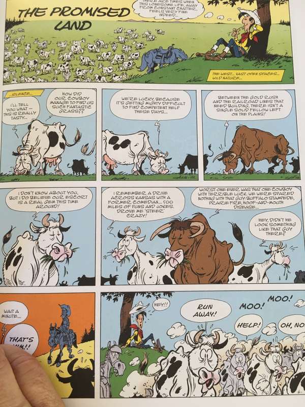 A LUCKY LUKE ADVENTURE - THE PROMISED LAND PAPER BACK 2017  - AS NEW