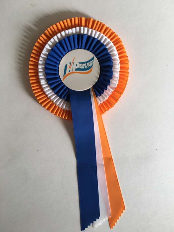 LOVELY VINTAGE ROSETTE OF FORMER POLITICAL PARTY AND FORMER PRESIDENT SIGNED ON REAR BY FW DE KLERK