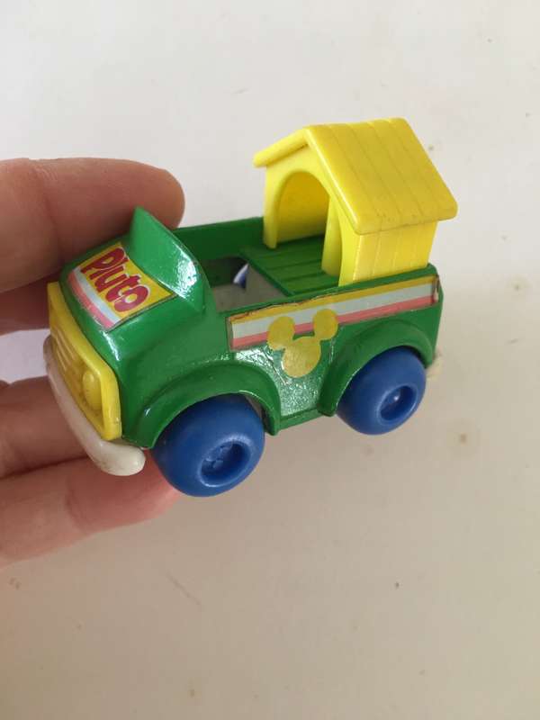 VINTAGE METAL AN PLASTIC PLUTO CAR