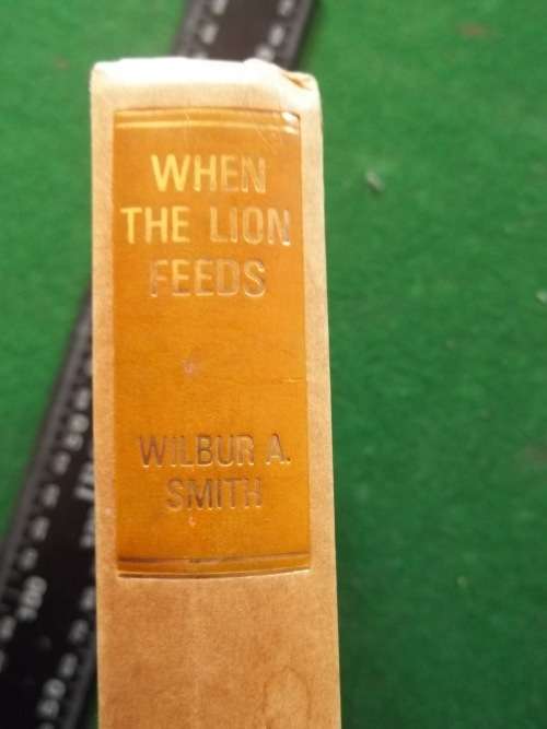 WILBUR SMITH ... WHEN THE LION FEEDS ... HARDCOVER .... SMALL SIZE