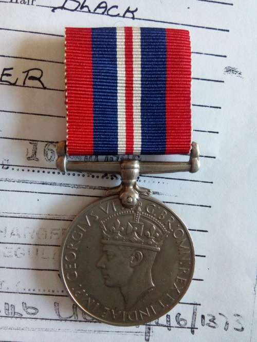 1939/45 WAR MEDAL .. FULL SIZE  WITH COPY OF RECORDS .. NAMED ....  J.J. BALIE