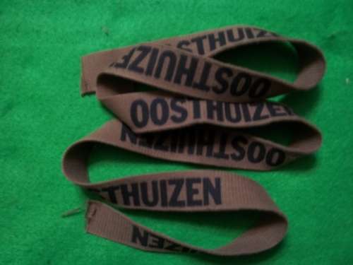 SADF NUTRIA UNCUT STRING OF 6 X OOSTHUIZEN NAME TAGS.