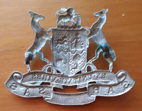 SA RAILWAYS WHITE METAL CAP BADGE - LUGS INTACT