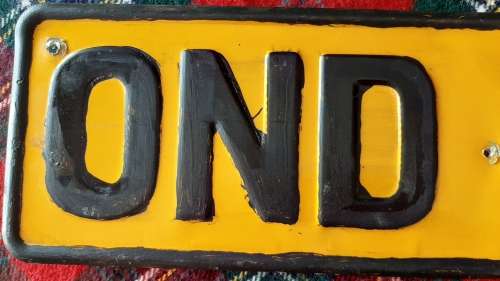 OLD (NOT CURRENT)  VEHICLE NUMBER PLATE - OND CLOCOLAN FREE STATE (BLACK REPAINTED)