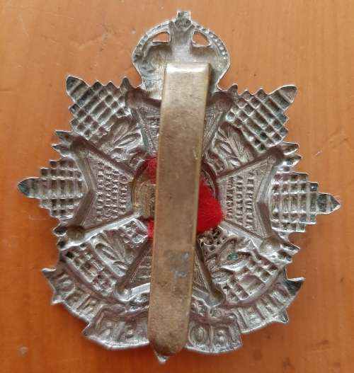 BRITAIN - THE BORDER REGIMENT CAP BADGE - SLIDER INTACT (WHITE METAL)