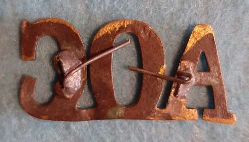 BRITAIN - ARMY ORDNANCE CORPS SHOULDER TITLE - REPAIRED PINS