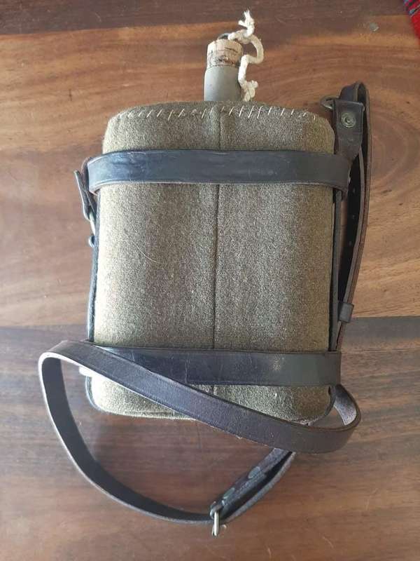 VINTAGE ENAMEL WATER BOTTLE WITH ALL LEATHER STRAPS (SAP STAMP ON BOTTOM )