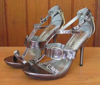 Silver high heels (size 8) for sale