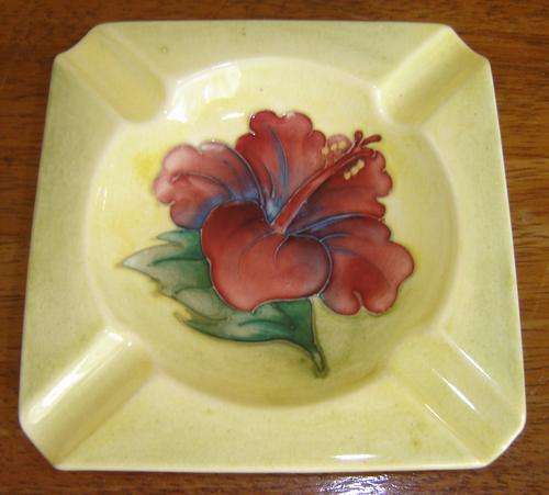 Moorcroft ashtray in Hibiscus pattern on yellow ground