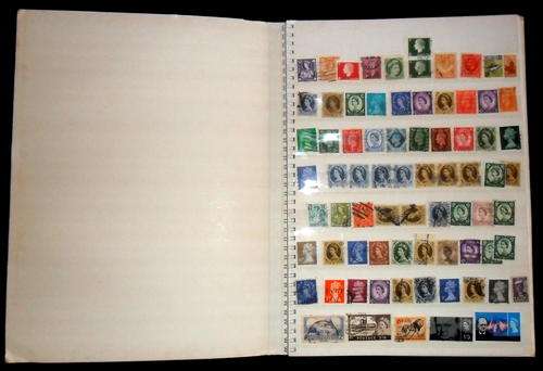 Stamp Album & 220 World Stamps. (Some are duplications)